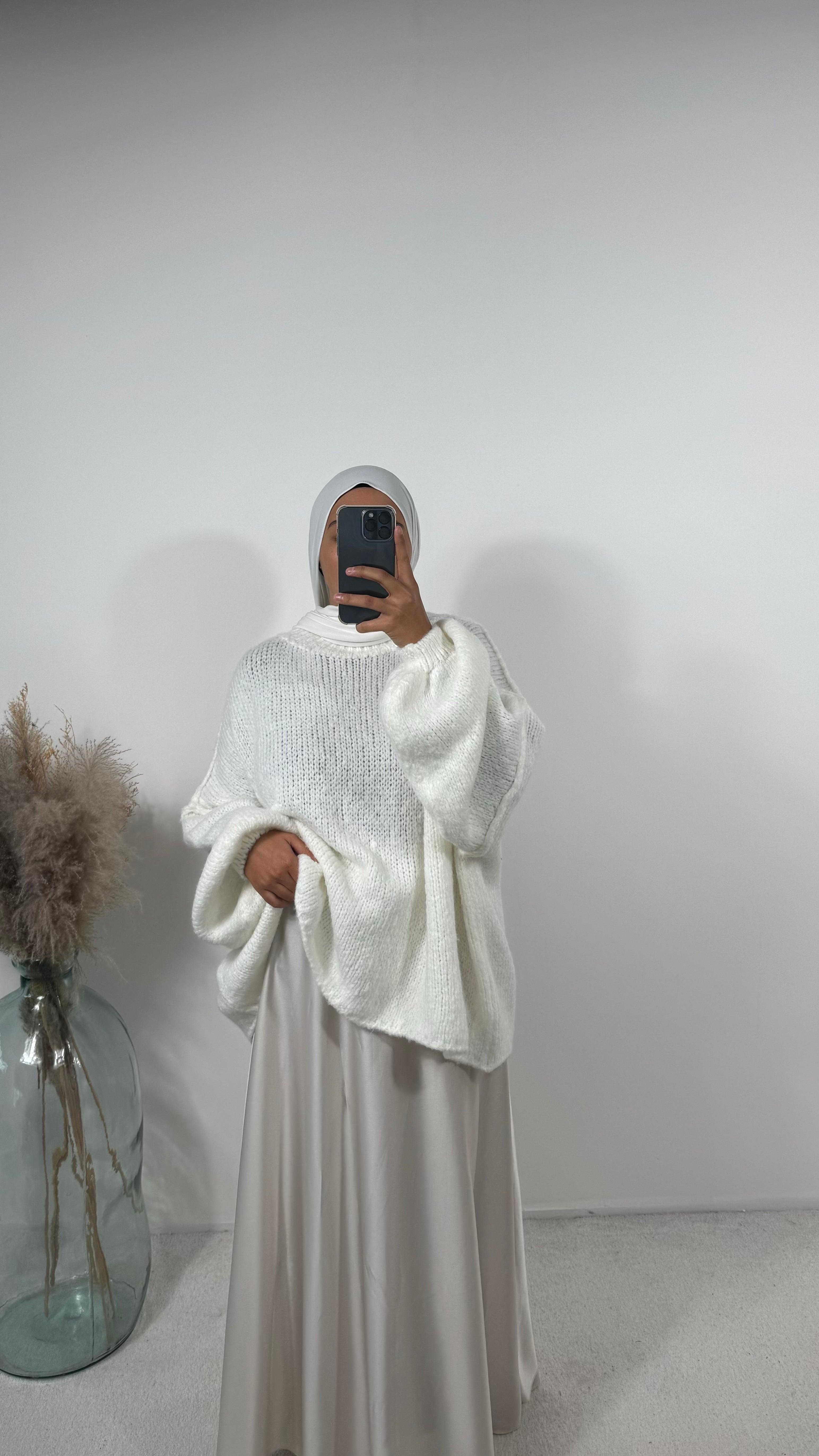 Pull en laine confortable, idéal pour des tenues décontractées ou élégantes pour l'automne et l'hiver.